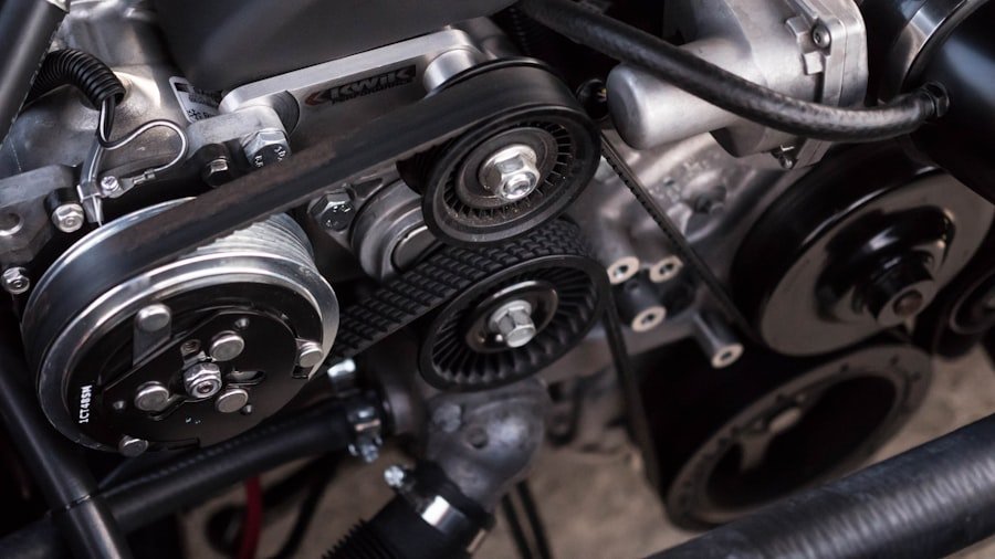 Close-up of engine belts and pulleys in a motor vehicle